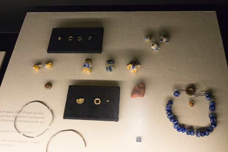 Gold jewellery displayed in an elegant shop window